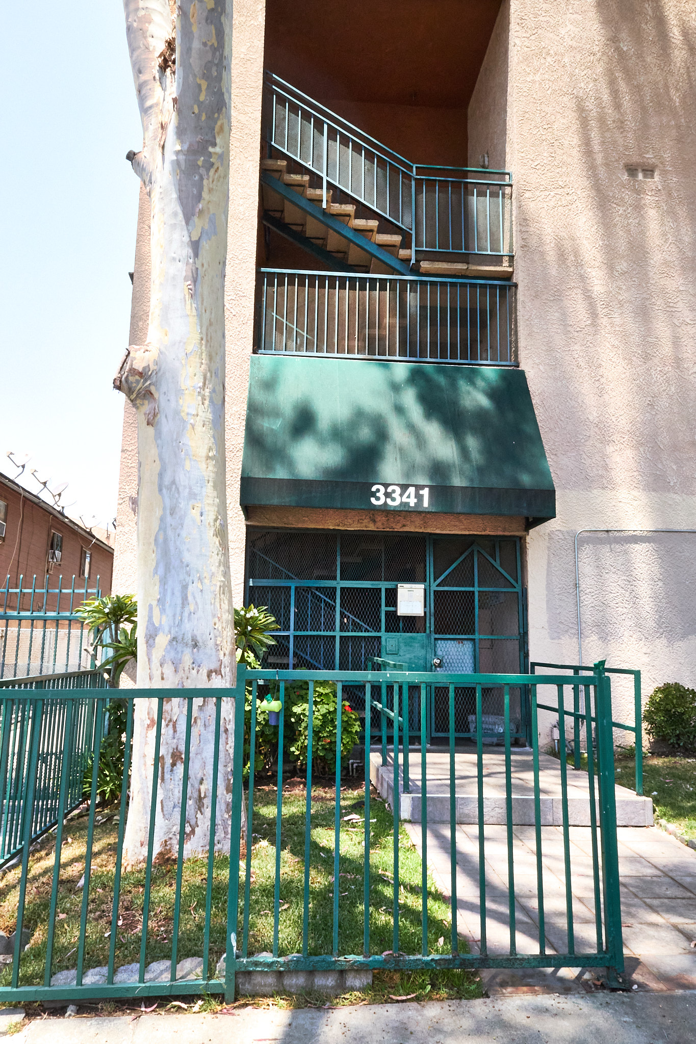 A building with the number 3341 on the awning.